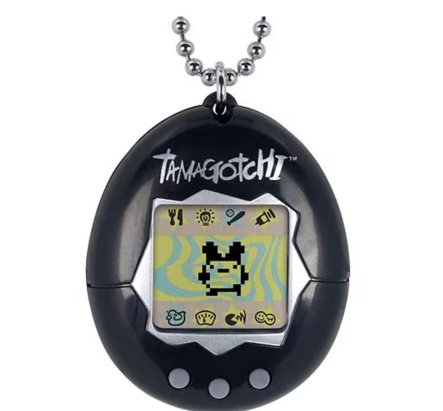 V statue with tiny Tamagotchi